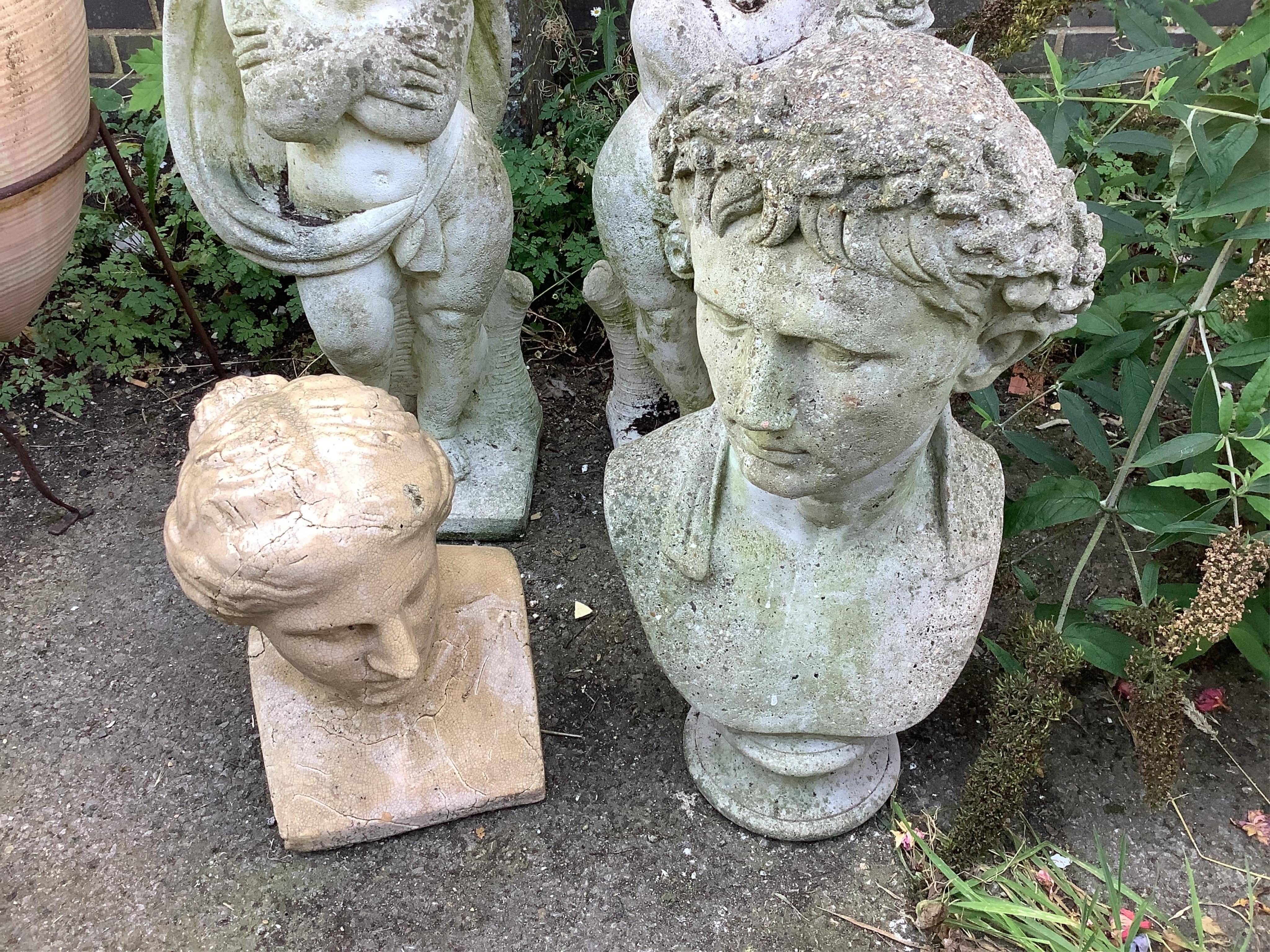 Two glazed earthenware and reconstituted stone garden busts, larger height 66cm. Condition - fair